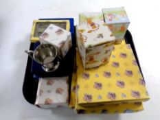 A tray containing a quantity of vintage Selangor pewter baby gifts
