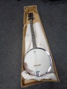 An Artist four string banjo