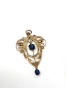 A vintage 9ct gold pendant