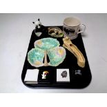 A tray containing Guinness Toucan pin, silver fob, USSR figure of a panda,