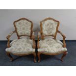 A pair of French beech framed salon chairs in studded tapestry fabric