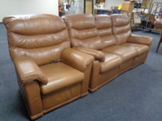 A contemporary G-Plan brown leather three seater manual reclining settee together with matching