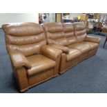 A contemporary G-Plan brown leather three seater manual reclining settee together with matching