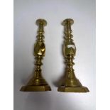 A pair of Victorian brass candlesticks