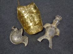 A decorative brass plate together with two wall hangings