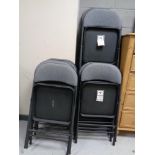 Approximately 16 contemporary folding chairs in grey upholstery