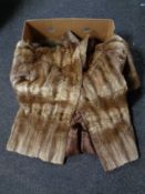 A mink fur coat by Marcus together with a further coat with fur collar