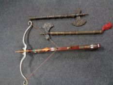 An ornamental crossbow together with a pair of decorative axes