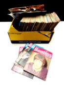 A box of a large quantity of 1980's Beatles Monthly books together with a quantity of unframed