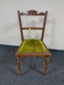 A late Victorian bedroom chair in studded green upholstery