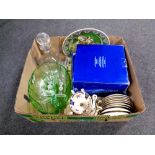 A box containing assorted china and glassware including boxed Avon Hummingbird dessert plates,