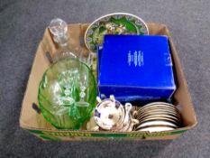 A box containing assorted china and glassware including boxed Avon Hummingbird dessert plates,