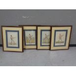 A set of four framed boxing prints