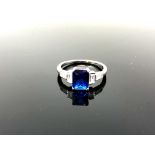 A sterling silver Art Deco style ring set with a blue stone,