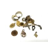 A small quantity of costume jewellery, pendants, miniature pistol charm,