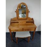 A contemporary pine mirror back dressing table with stool