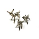 Three silver plated fawns