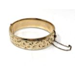A vintage 9ct gold plated bangle