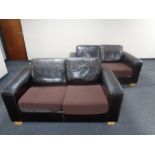 A pair of contemporary brown leather two seater settees