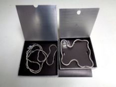 Two boxed Breil articulated necklaces