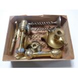 A box containing a pair of brass wall lights, pair of brass candlesticks,