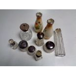 A collection of silver topped items including dressing table pots,