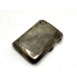 A small silver cigarette case, 67.