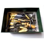 A box containing a large quantity of loose stainless steel and silver plated cutlery