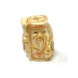 A carved Chinese bone netsuke - Bearded Gentleman with staff and gown