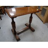 An Edwardian oak occasional table