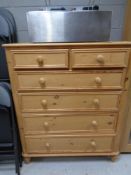 A pine chest of six drawers