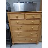 A pine chest of six drawers