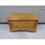 A contemporary pine blanket box