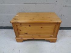 A contemporary pine blanket box