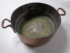 A 19th century copper cooking pot