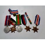 A group of First and Second World War medals including a 1914-15 Star awarded to R-10854 PTE T. A.