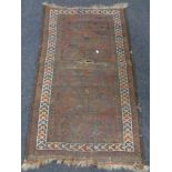 An antique Afghan rug,