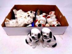A box containing five pairs of Staffordshire style dogs together with one other