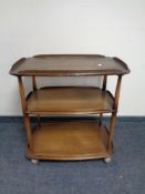 An Ercol three tier drinks trolley