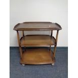 An Ercol three tier drinks trolley