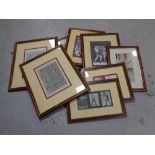 A group of approximately nine framed boxing prints