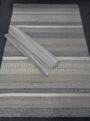 Two contemporary rugs