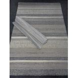 Two contemporary rugs