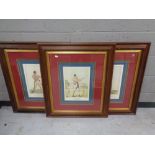 A set of three framed boxing prints