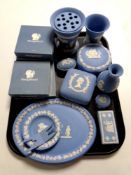 A tray containing a large quantity of boxed and unboxed Wedgwood blue and white jasperware