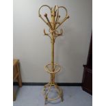 A wicker hat and coat stand