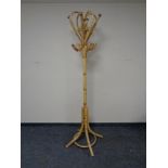 A wicker hat and coat stand