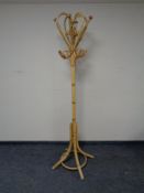 A wicker hat and coat stand