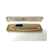A Lotus simulated pearl necklace in original box
