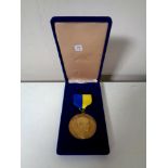 A Rotary medal in fitted box